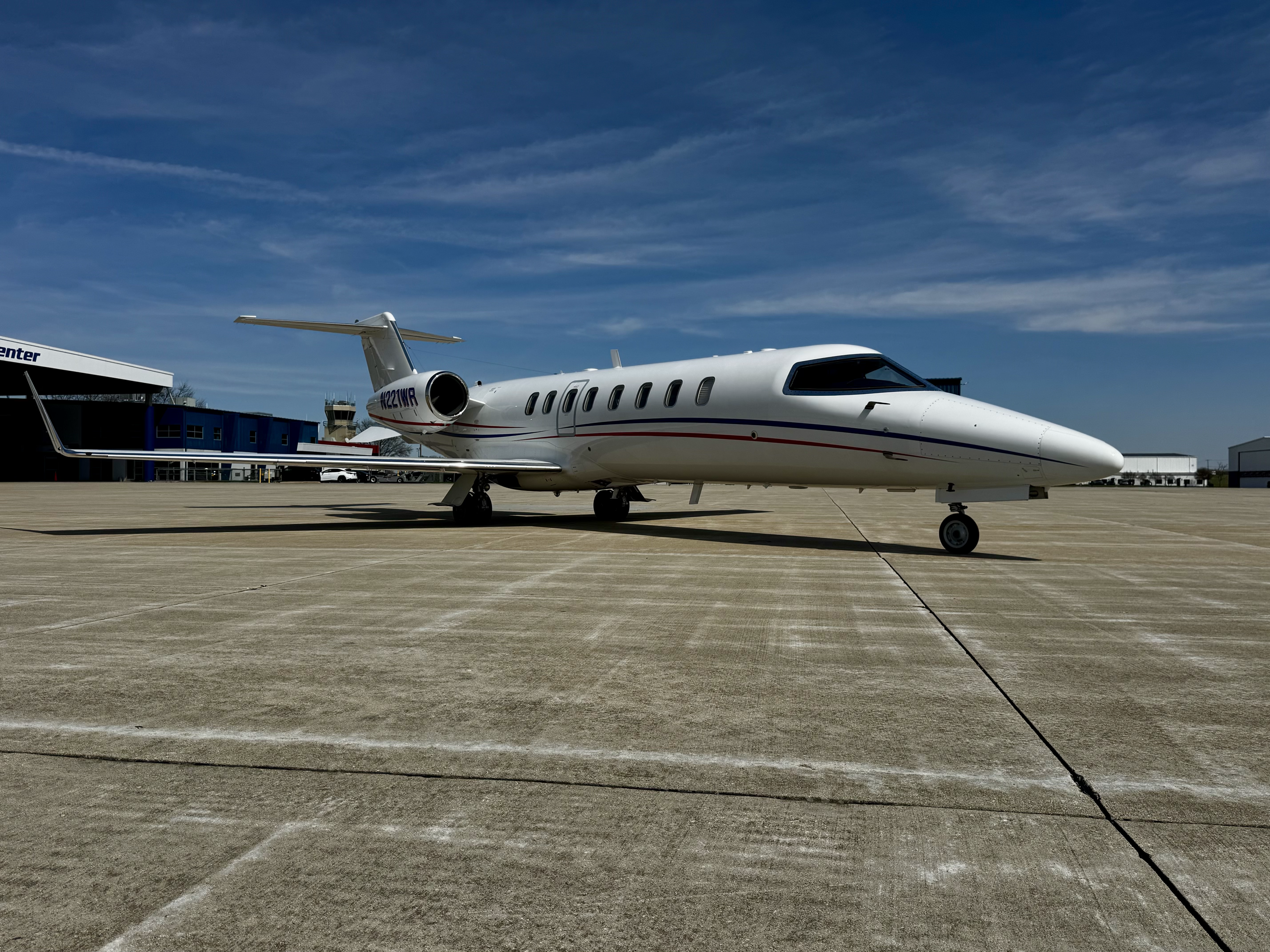 Learjet 45XR parked on the tarmac.