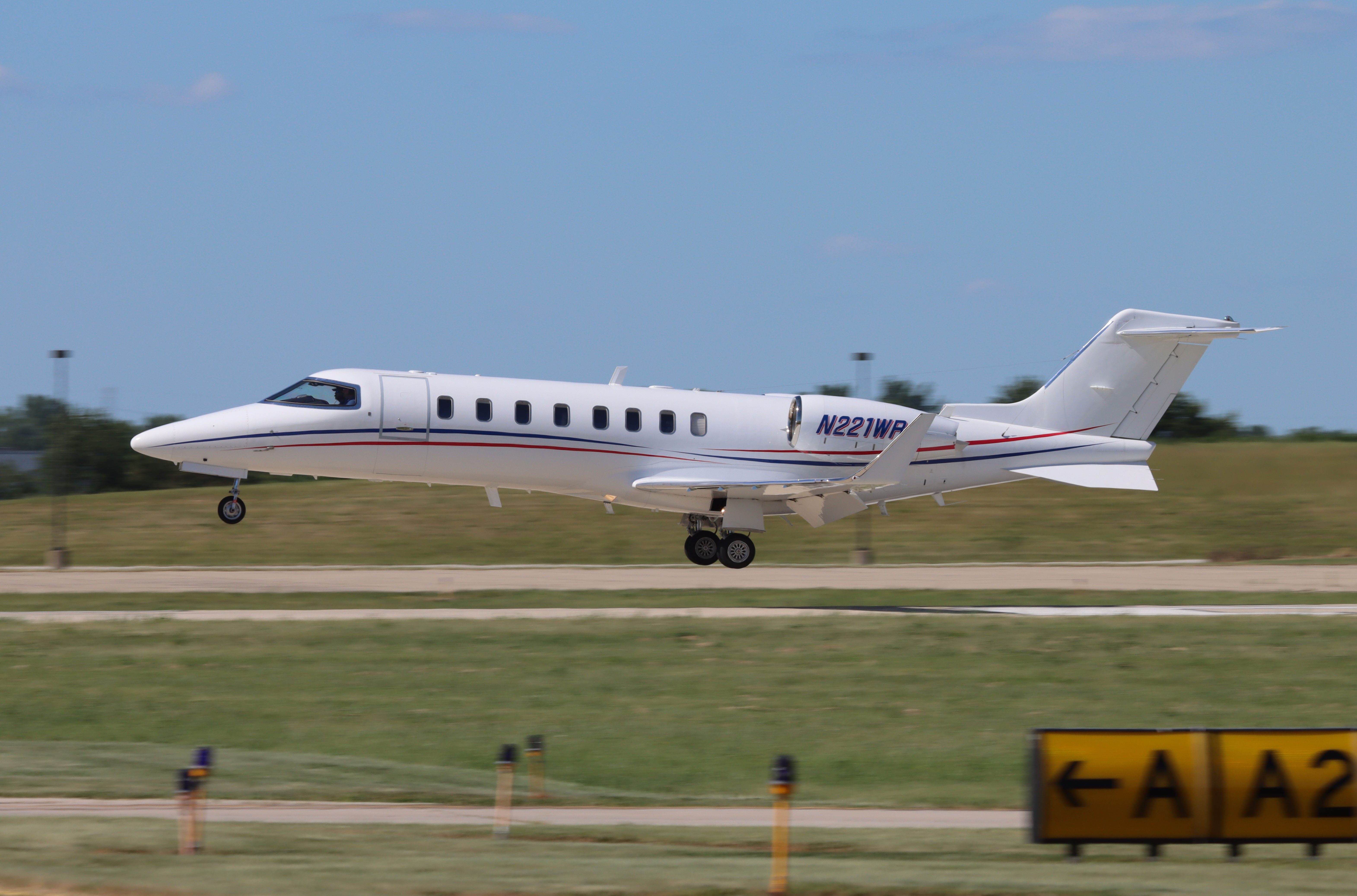 Learjet 45XR landing on the runway.